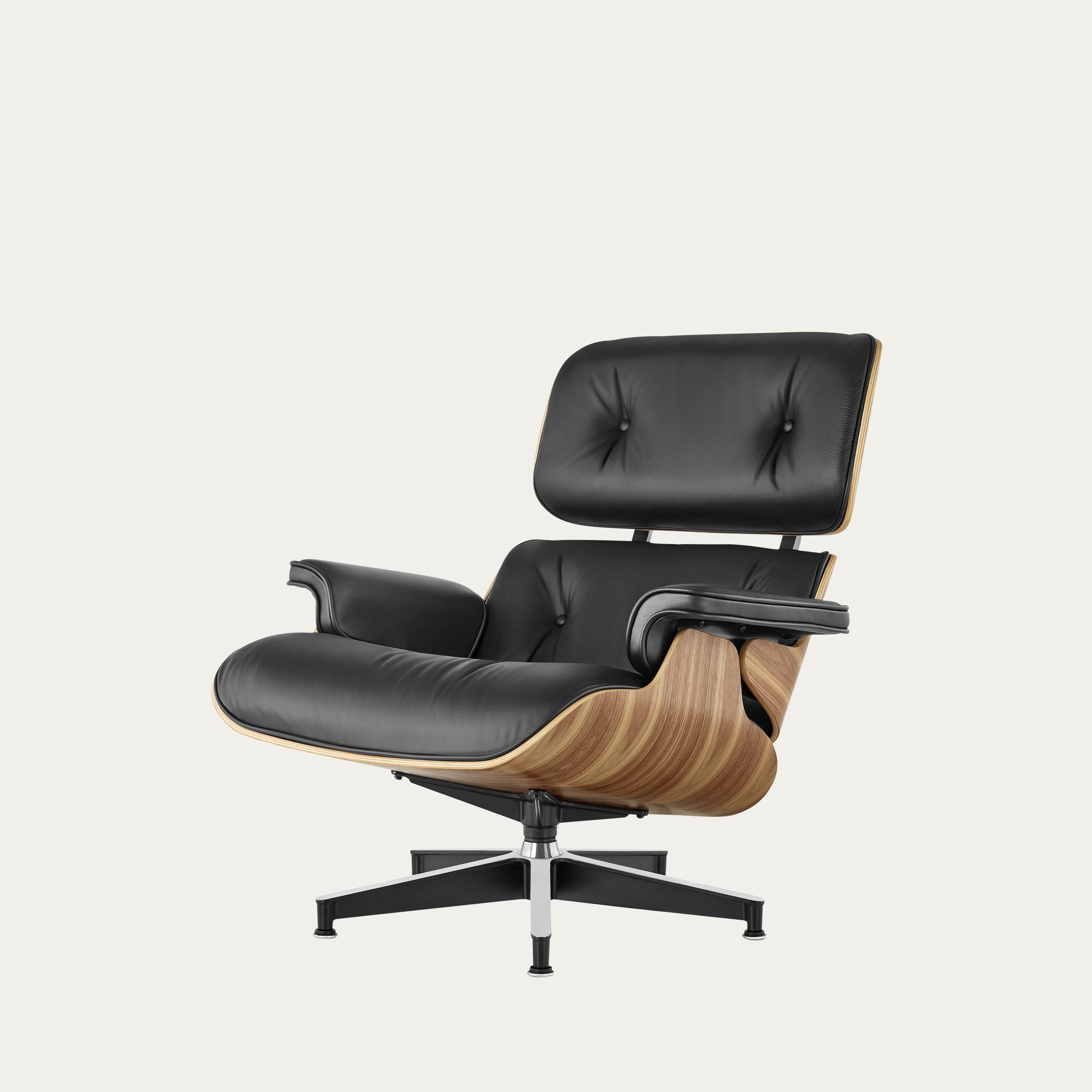 Seitenansicht des Eames Lounge Chair von Charles & Ray Eames in entspannter Sitzposition mit geneigter Rückenlehne