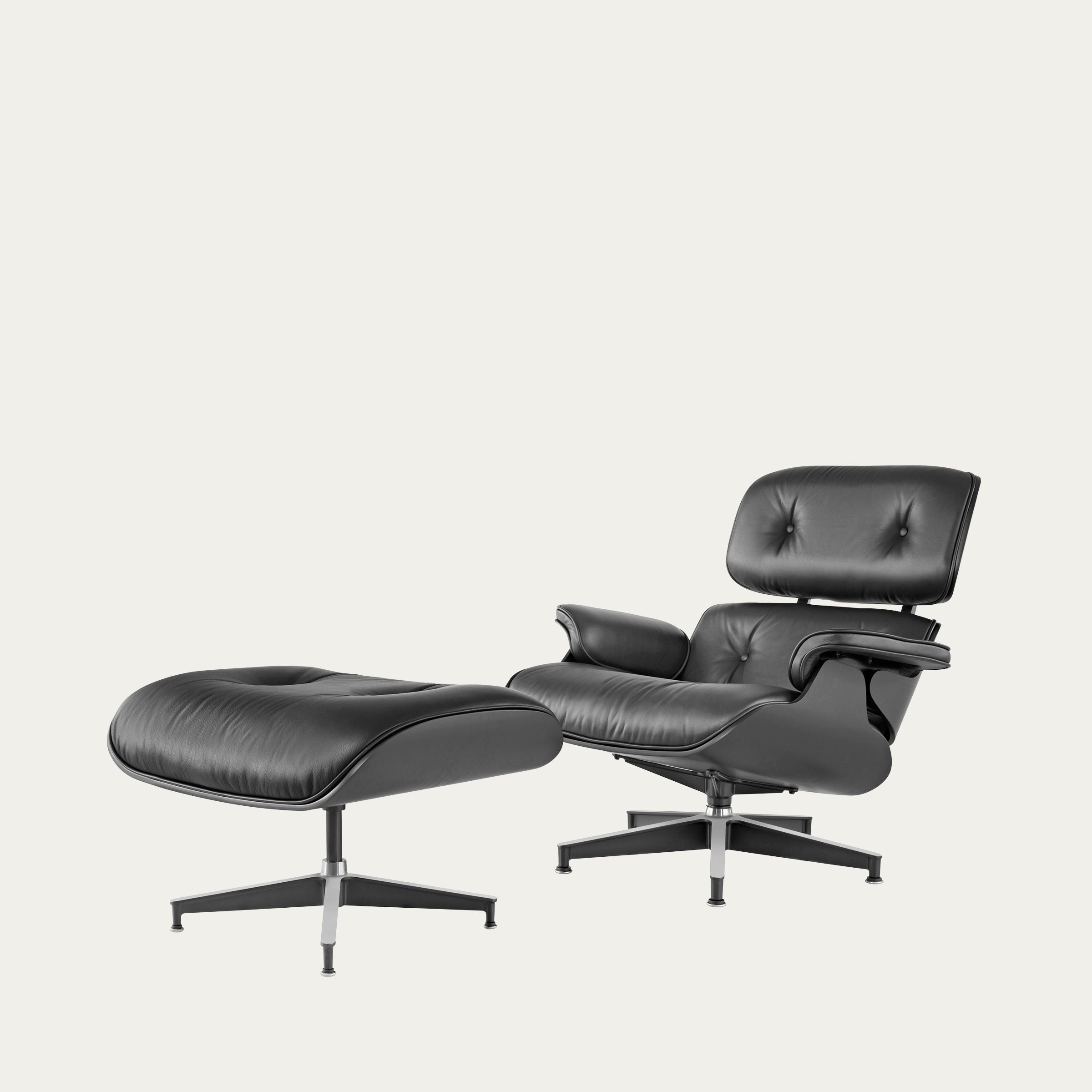 Seitenansicht des Eames Lounge Chair mit Ottoman von Charles & Ray Eames als ikonisches Mid-Century Relax-Set