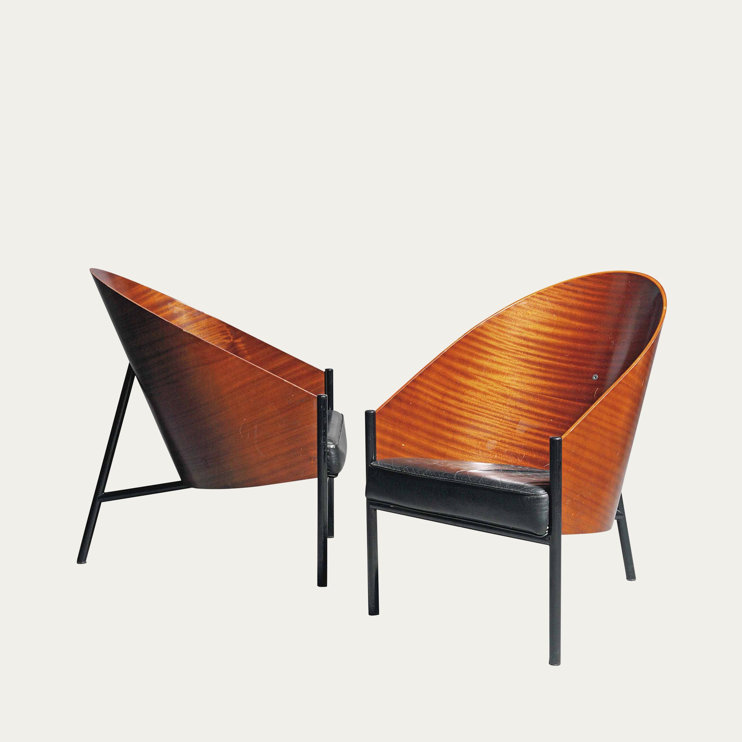 Pratfall Schalensessel von Philippe Starck (1984) in edlem Holzfurnier mit schwarzem Ledersitz, moderner Designklassiker