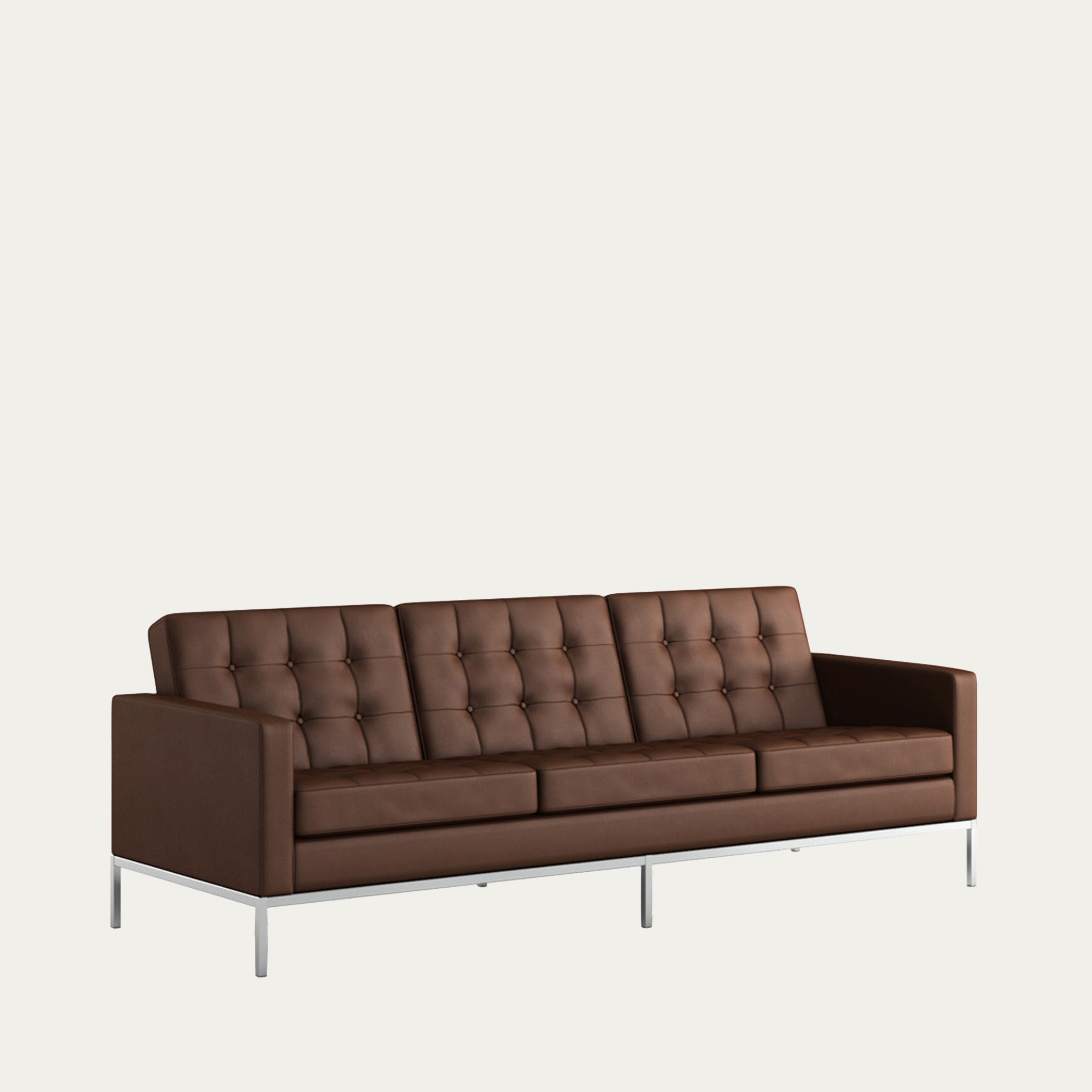 Dreisitiges Sofa von Florence Knoll aus dem Jahr 1954, gezeigt in braunem Leder mit charakteristischer Knopfsteppung und filigranem Metallgestell